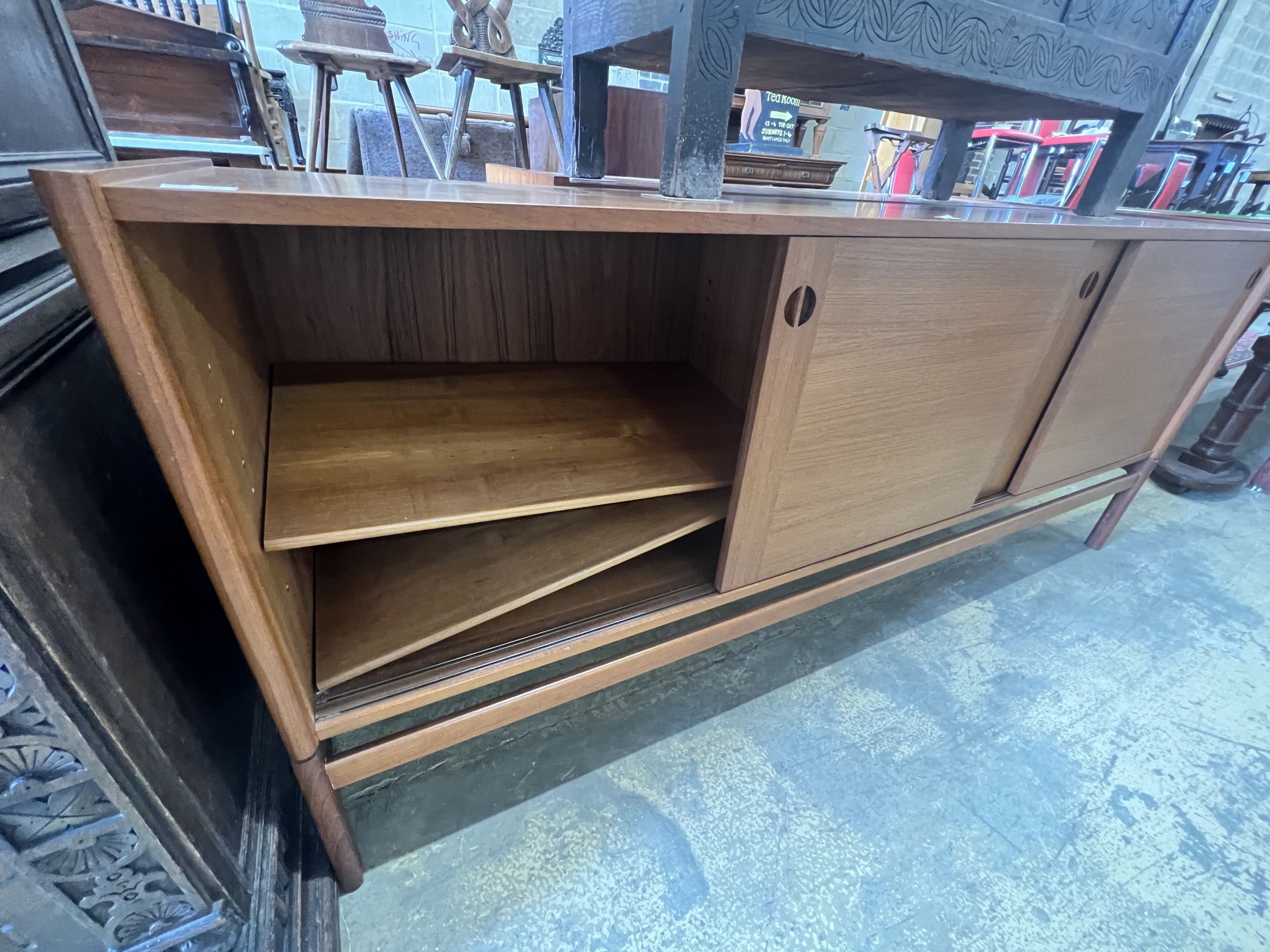 A 1950's Danish teak tambour sideboard, width 200cm depth 46cm height 86cm